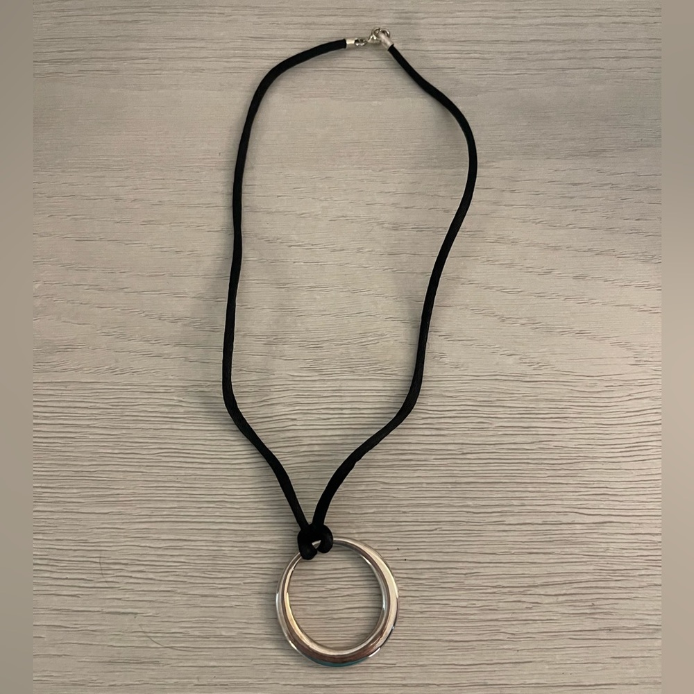 Black silky corded necklace with shiny silver hoop charm